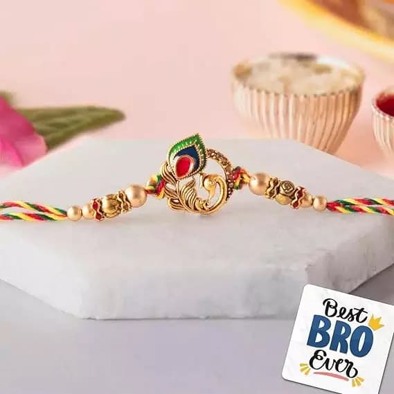 eCraftIndia Golden Peacock Colorful Feathers Designer Rakhi,200g-Main image