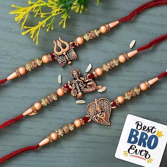 eCraftIndia Red & Golden Trishul with Damru, Lord Ganesha, & Lord Krishna Playing Flute Religious Rakhis.200g-Main image